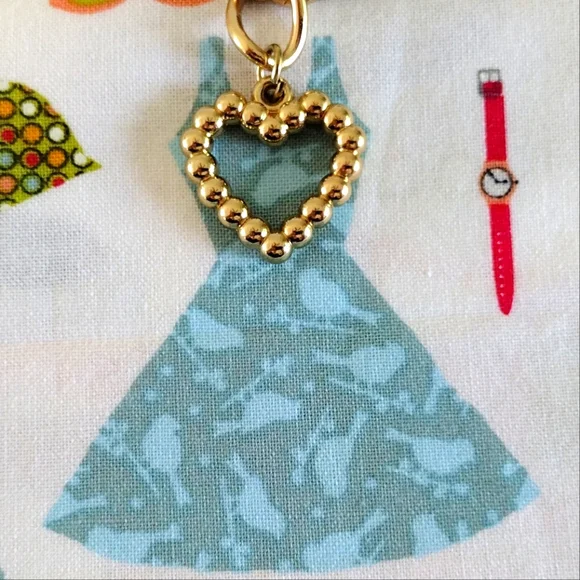 Guess Gold-Tone Romantic Charm Bracelet - Picture 7 of 10